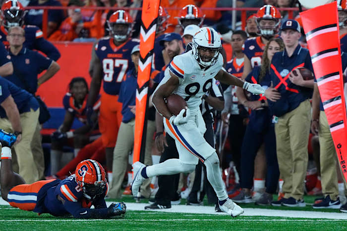 Virginia Cavaliers wide receiver Keytaon Thompson (99) runs with the ball after making a catch against the Syracuse Orange during the second half at JMA Wireless Dome.
